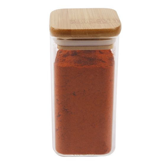 Glass jar of chili powder